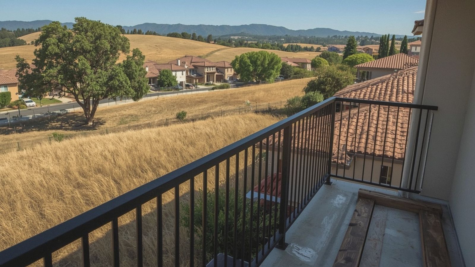 New metal balcony railing replacing an old wood rail